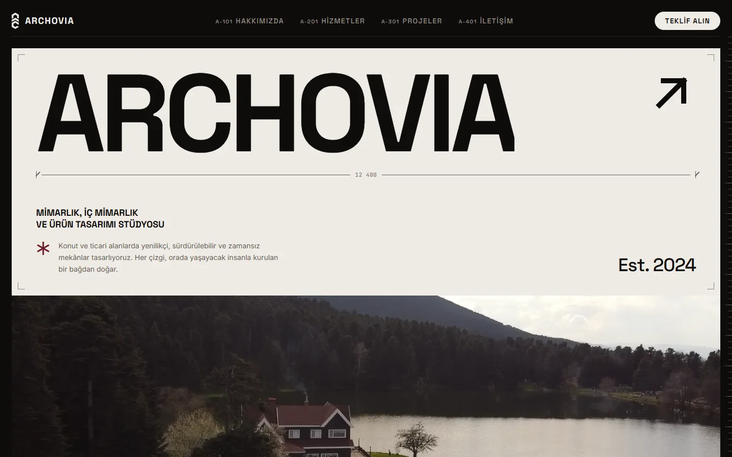 Homepage of the Archovia website, with the studio name in giant black type above a lakeside house