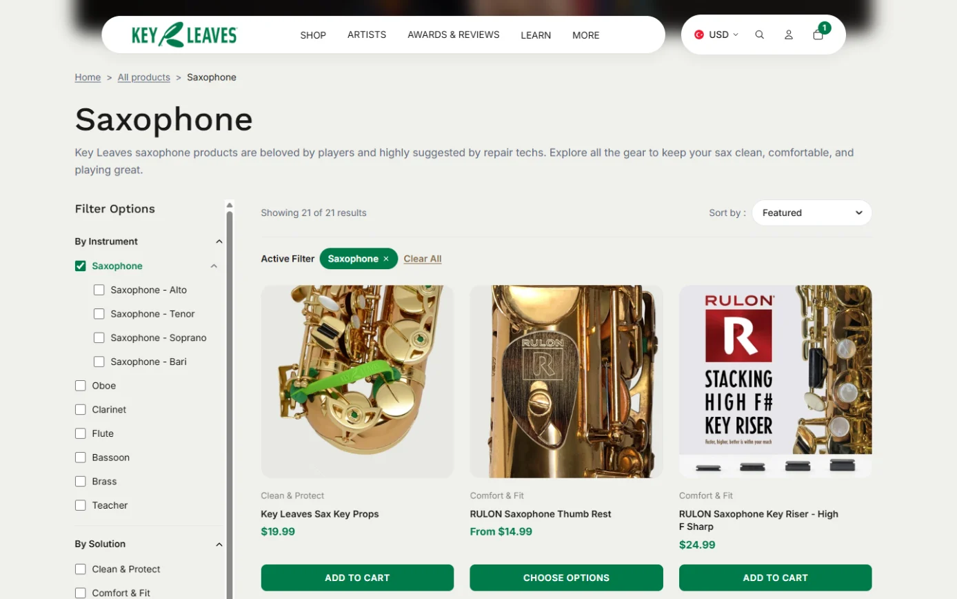 Key Leaves saxophone collection page with a filter sidebar for instrument type, alto, tenor, soprano and bari, and solution, beside product cards with add-to-cart buttons